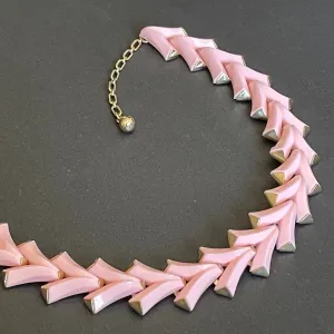 Vintage signed Trifari 'Valencia' baby coral pink thermoset and gold tone chevron design collar necklace from 1956